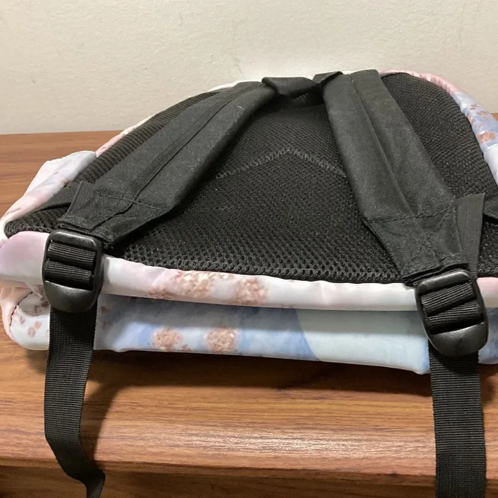 Yin Lang Nylon Backpack by Soundbyte in Pink & blue pattern.